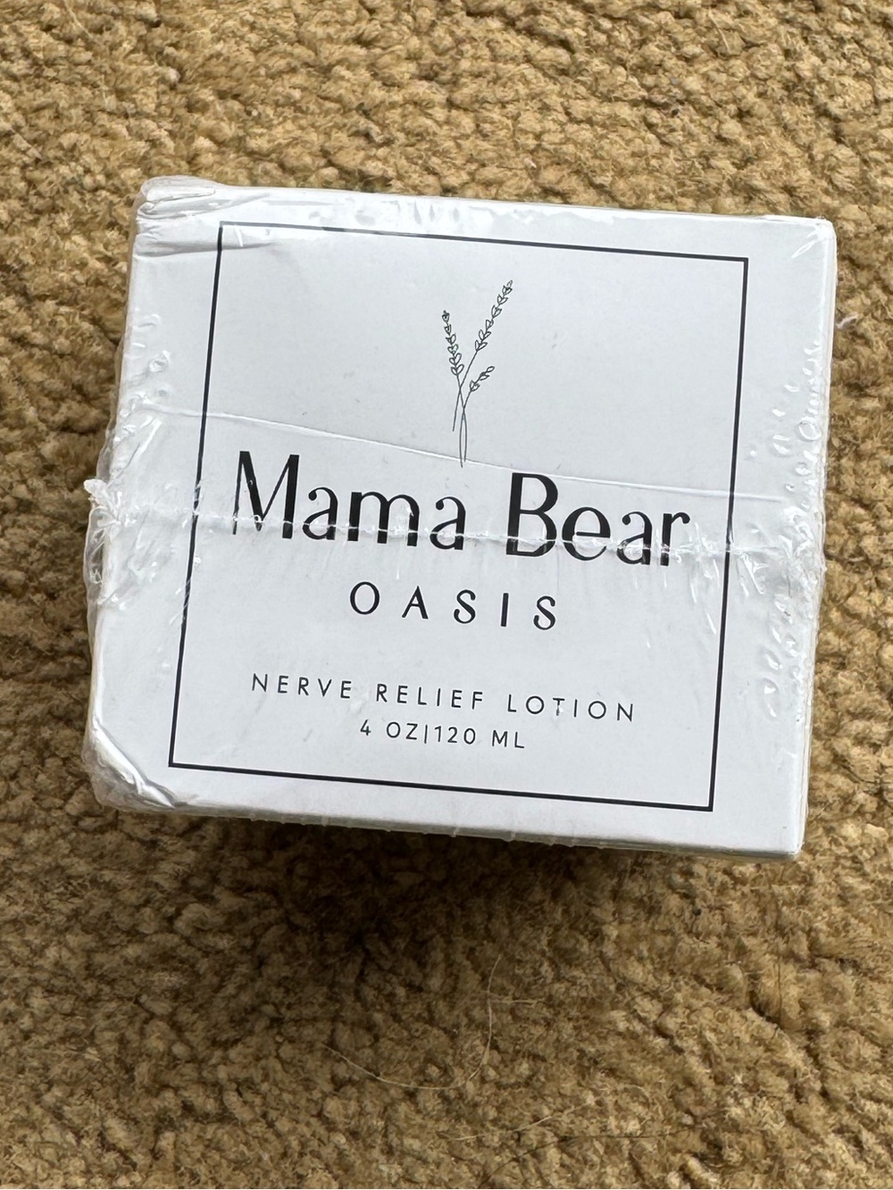 4oz bottle of Mama Bear Oasis Nerve Relief Lotion magnesium-based cream